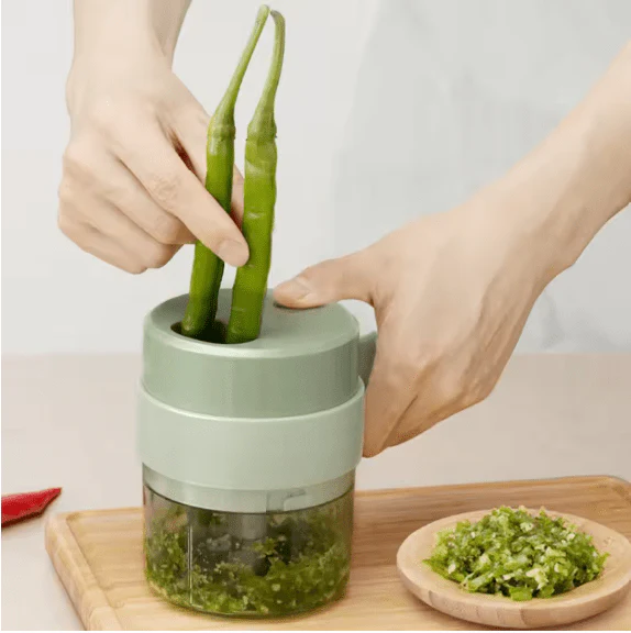 Introducing the 4 in 1 Handheld Electric Vegetable Cutter Set - chop, slice, and mince with ease!